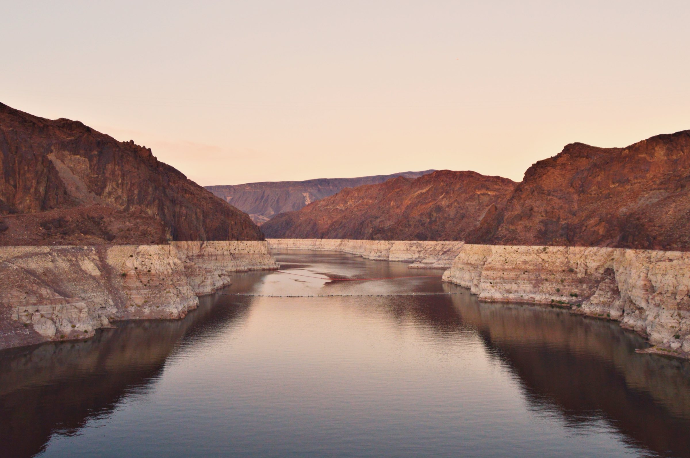 The Colorado River winding through Black Canyon near Boulder City, Nevada at dusk